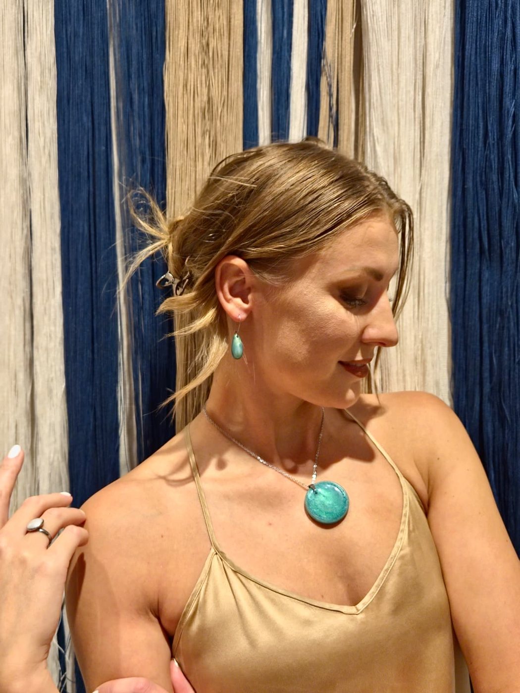 Woman wearing Coastify jewelry